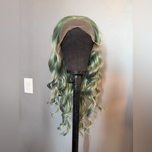 Brand new 13x3 tonal green synthetic wig. 26 inches